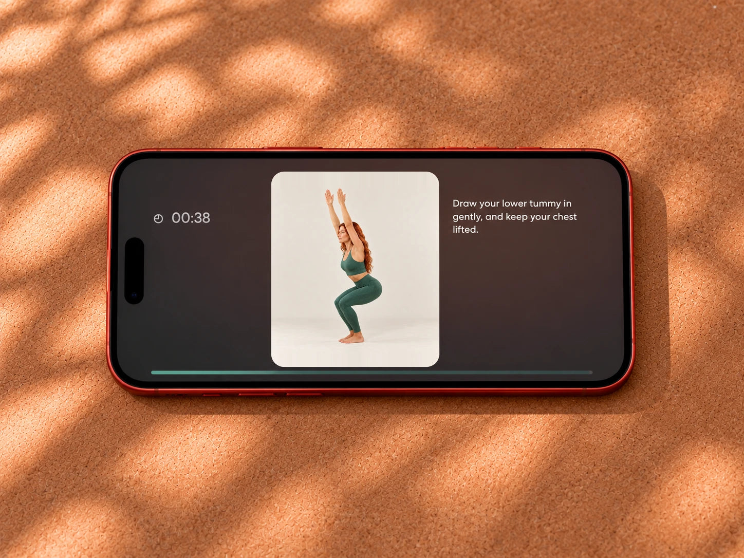Yoga Space guided sequence player on a phone resting on a cork mat