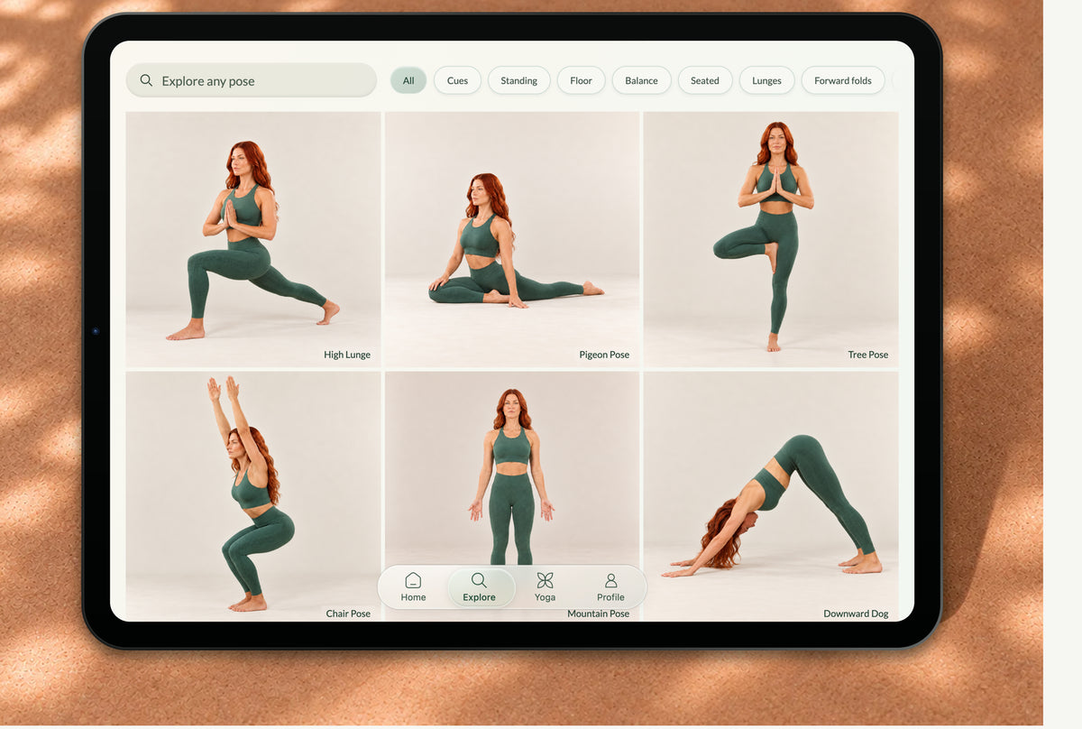 Yoga Space pose library on an iPad on a cork mat