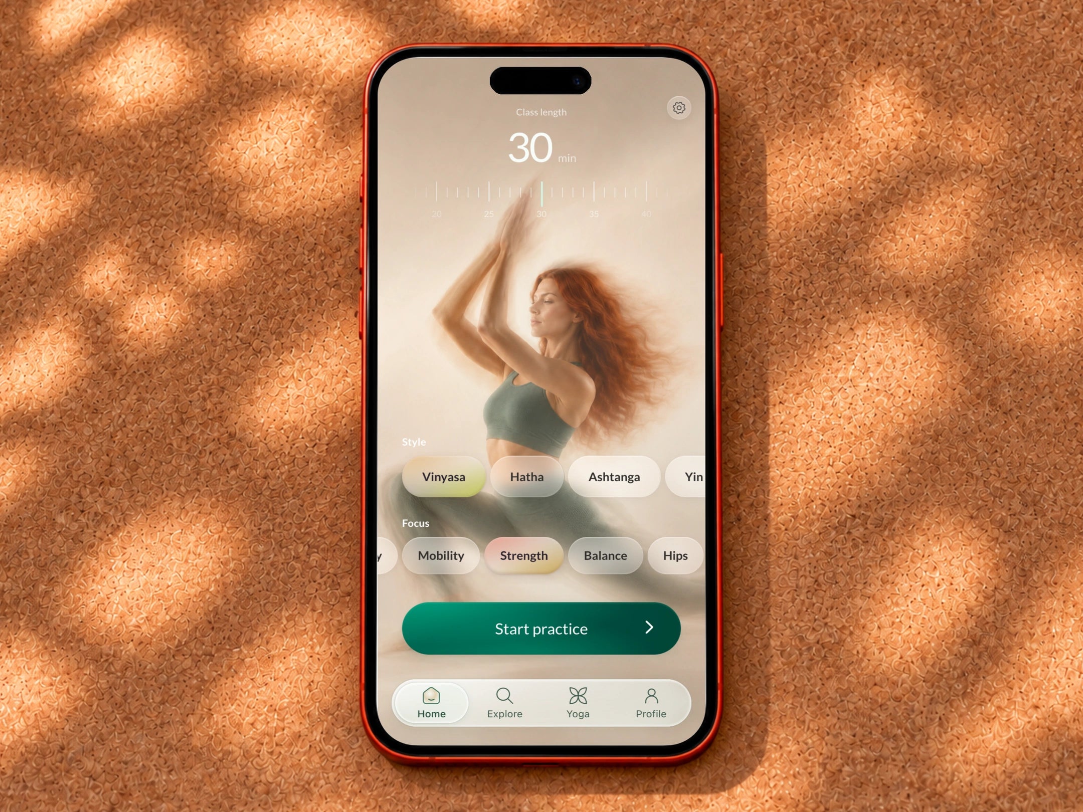 Yoga Space current practice settings on a phone resting on a sunlit cork mat